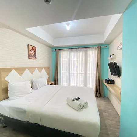 Modern And Comfy Studio Room At Grand Asia Afrika Apartment By Travelio